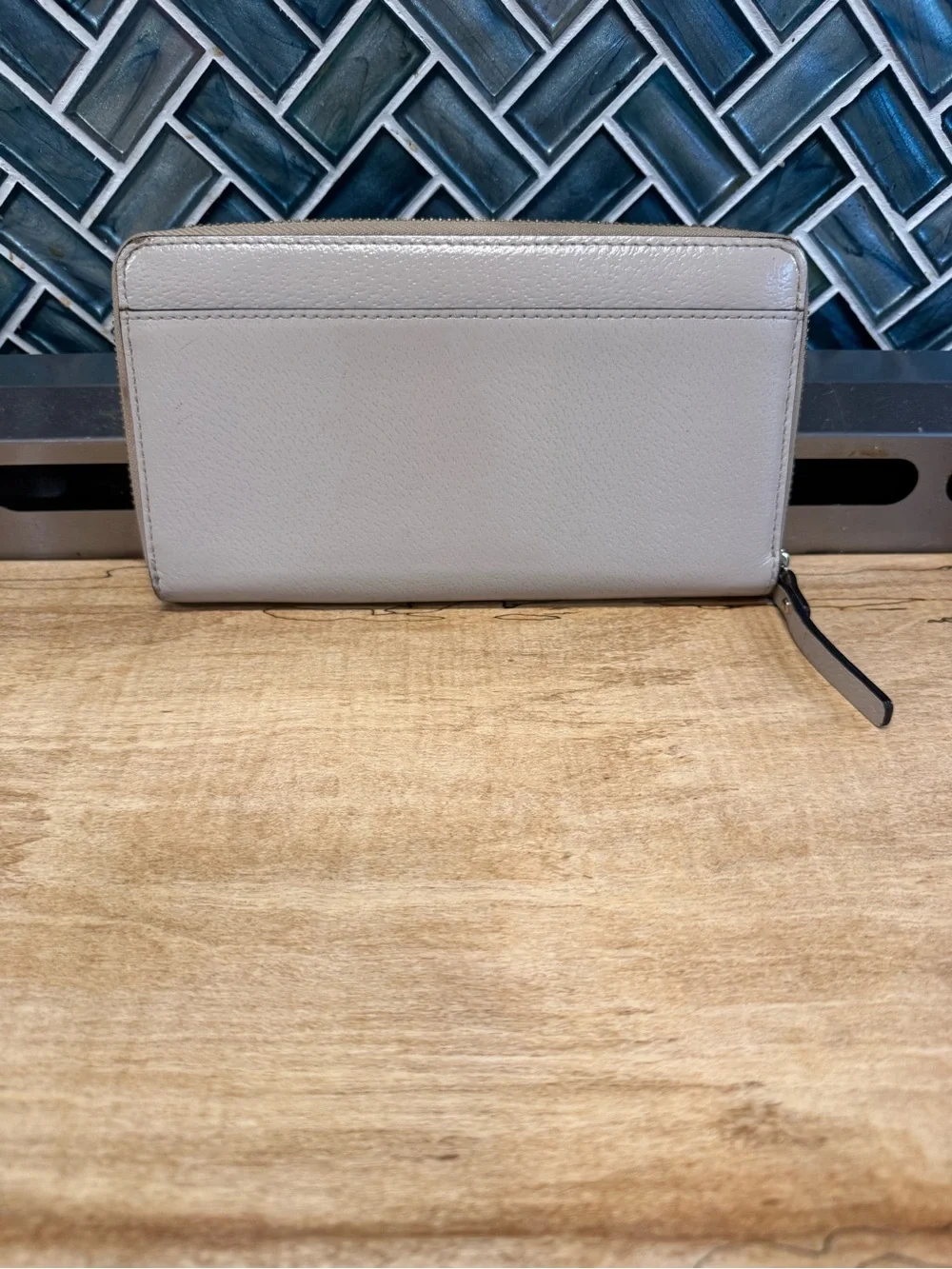 kate spade Pebbled Zip Wallet in cream/beige